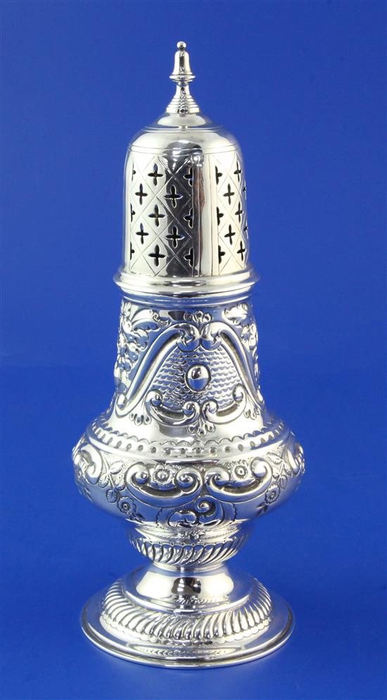 A late Victorian repousse silver sugar caster, 5.5 oz.